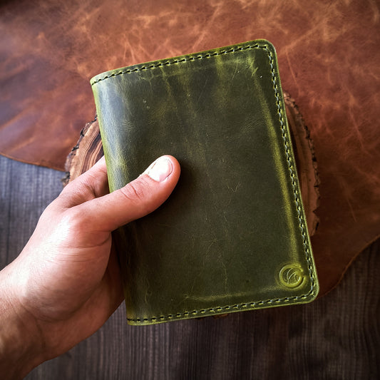 Travel notebook and passport cover from green colour leather