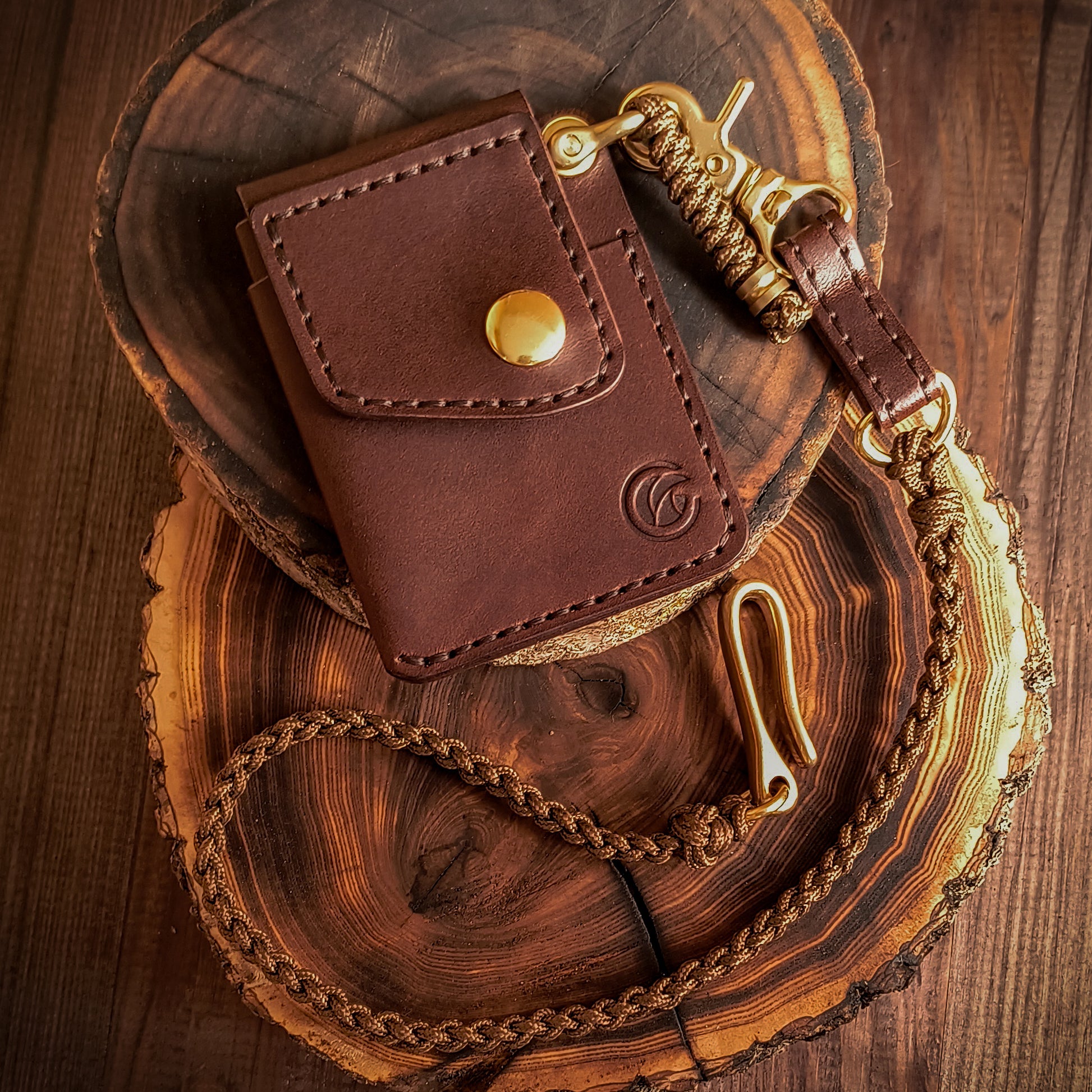 Slim chocolate brown leather wallet on lanyard with fully hand braided cooper-colored paracord strap 