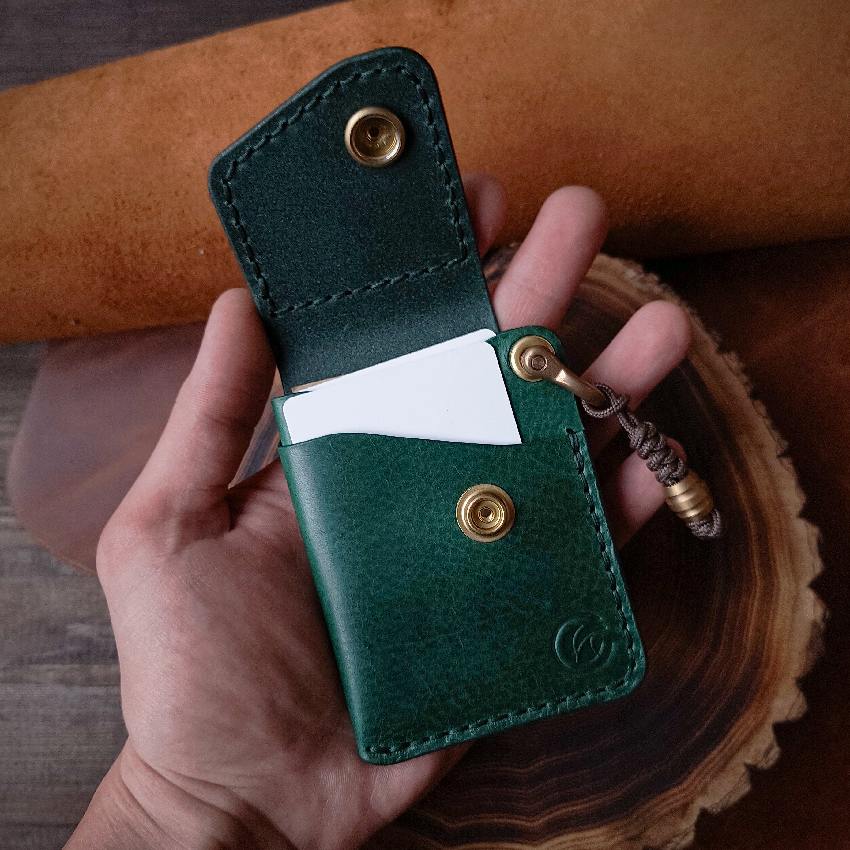 Handmade slim emerald green leather EDC wallet on braided lanyard