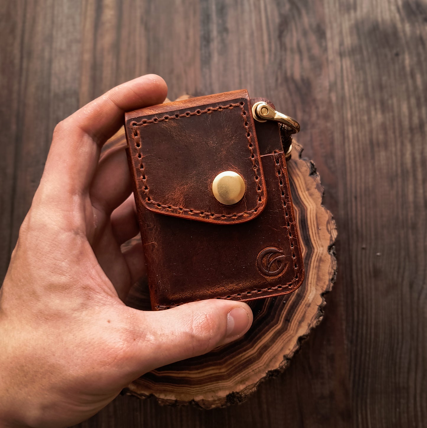 Minimalist wallet made from rusty brown Crazy Horse leather in compact and slim design 