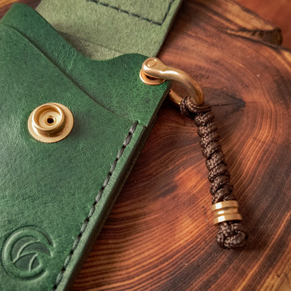 Wallet from smooth vegetable tanned waxy leather in deep green colour 