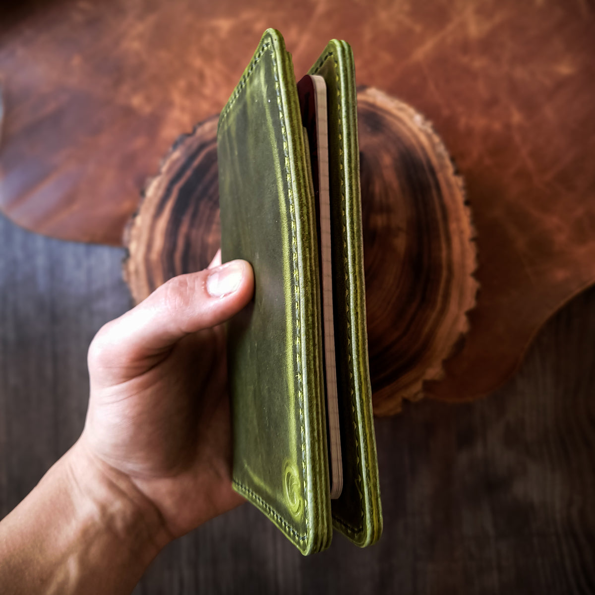 Field journal wallet made from Crazy Horse phistachio green pull up leather 