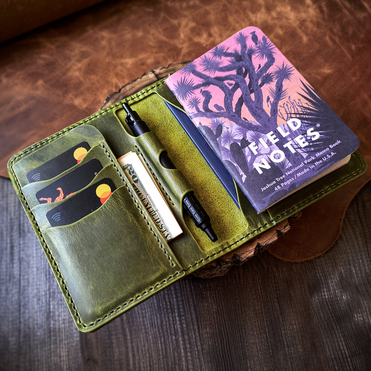 Handmade leather Field Notes and passport organiser with pen loop in phistachio green colour 