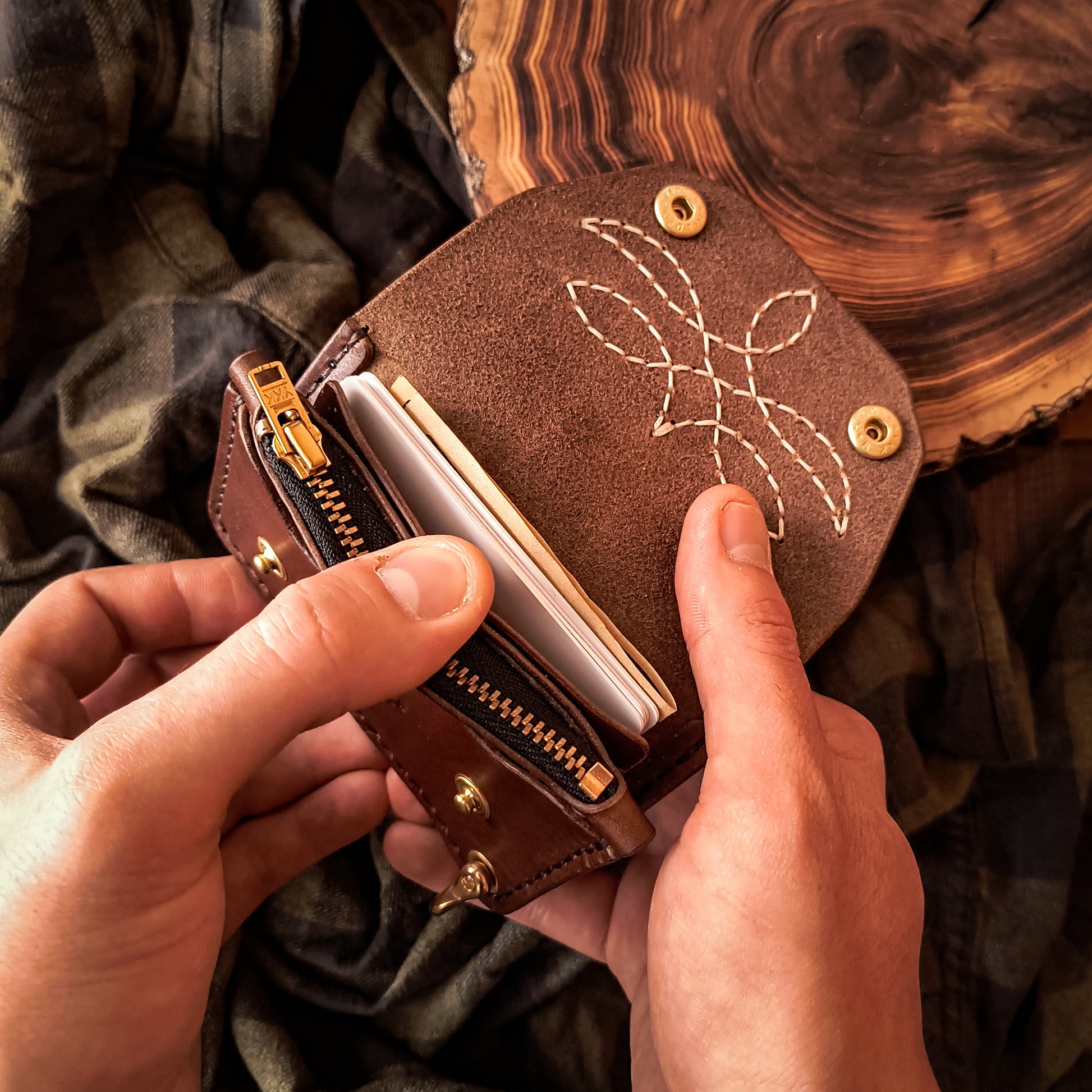 Small leather biker wallet with card and cash slots and solid brass hardware 